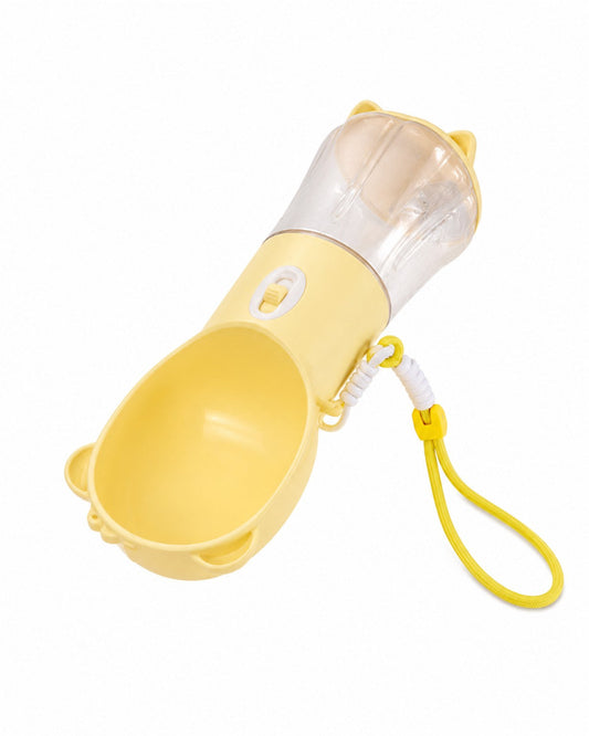 Yellow KivoPet portable pet water bottle on white background